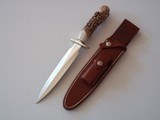 Randall Model # 2-7" Fighting Stiletto
Carved Handle with 18 faces A Masterpiece Original Scabbard - 3 of 9