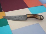 James L. Batson,Jr Moran the Pirate Bowie carved by Paul G. Grussenmeyer Damascus 