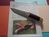 Jean TANAZACQ model Tronçay 1 from the 1990's, like new, chocolate leather sheath, beautiful mirror-polished blade, brass guard.