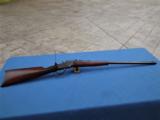 WINCHESTER MODEL 1885 - 22 WCF CALIBER - 26" # 1 BARREL - TAKEDOWN - GRADUATED PEEP SIGHT - LETTERS ALL THE WAY !
- 9 of 14