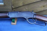 WINCHESTER 1876 RIFLE 28" OCTAGON BARREL FULL MAGAZINE AND ORIGINAL CLEANING RODS IN BUTT - 12 of 15