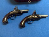 Cased Pair of 18th Century Flintlock Queen Anne Ornate Silver Mounted Pistols with Accessories - 14 of 17