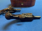Cased Pair of 18th Century Flintlock Queen Anne Ornate Silver Mounted Pistols with Accessories - 8 of 17