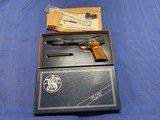 Smith and Wesson Model 41 new in the box and Accessories - 1 of 16