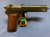 Model 1911 Steyr Hahn Chilean Military Issue . 9MM . Serial number 162. 1 of 5000 - 7 of 13