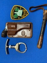 Hopkins 2” “ Bicycle “
gun w/ N.J police Officer - Iron Claw - Club - Holster and Patch - 1 of 13