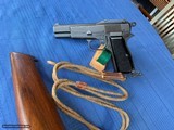 BROWNING HI POWER WW2 CANADIAN MILITARY ISSUE WITH STOCK AND LANYARD- UNTOUCHED ORIGINAL WW2 - 1 of 15