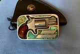 NORTH AMERICAN ARMS CO. 22 Long Rifle TURQUOISE BUCKLE GUN - 1 of 25