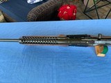 JOHNSON AUTOMATIC RIFLE- SER . # A3172 -
WW2 ORIGINAL - 15 of 22