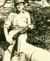 JOHNSON AUTOMATIC RIFLE- SER . # A3172 -
WW2 ORIGINAL - 17 of 22