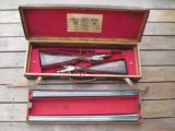 Matched Pair of Joseph Lang Snap Action Underlever Pigeon Guns (1882) in Original Case with Accessories
- 1 of 12