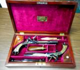 HISTORIC CASED PR OF PRESENATION
QUALITY HIGHLAND GOLD INLAIL ALL METAL FLINTLOCK PISTOLS BY WHEELER & SONE PRESENTED TO THE MARQUESS OF BREADALBANE
- 2 of 5