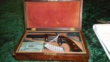 CASED S & W FIRST ISSUE SA REVOLVER WITH ORIGINAL BOX OF 32RF CARTRIDGES 75% COND. - 1 of 3