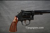 Smith & Wesson 48-4 (2 Cylinder Custom Engraved) - 3 of 6