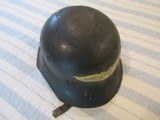 Original Luftschutz Helmet 38/28
model 1938 Beaded Gladiator Helmet, with distribution label ,section 8, has most of the liner & chin strap,95 %paint - 5 of 7