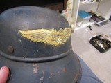 Original Luftschutz Helmet 38/28
model 1938 Beaded Gladiator Helmet, with distribution label ,section 8, has most of the liner & chin strap,95 %paint - 6 of 7