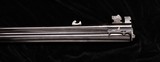 Defourny, Herstal Belgium.
Over and Under Combination Gun. Big Game High Power Rifle 9.3 x 74R and 12 GA 2 3/4 Full choke Barrels - 12 of 13