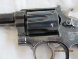 SMITH & WESSON
MODEL 17 ( 4 screw model)
.22 cal. Revolver - 4 of 15