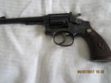 SMITH & WESSON
MODEL 17 ( 4 screw model)
.22 cal. Revolver - 2 of 15