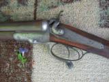 HAMMER GUN 12 GAUGE BY I. HOLLIS AND SONS - 1 of 11