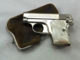 Colt Model 1908 25 A.C.P. Nickeled With Pearl Grips And Coin Purse - 1 of 11