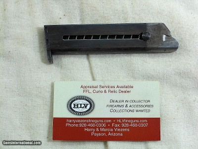 Early Colt Woodsman Magazine With Bronze Follower