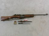 Johnson Automatics Model 1941 Military Rifle In Near New Condition With Bayonet And Scabbard