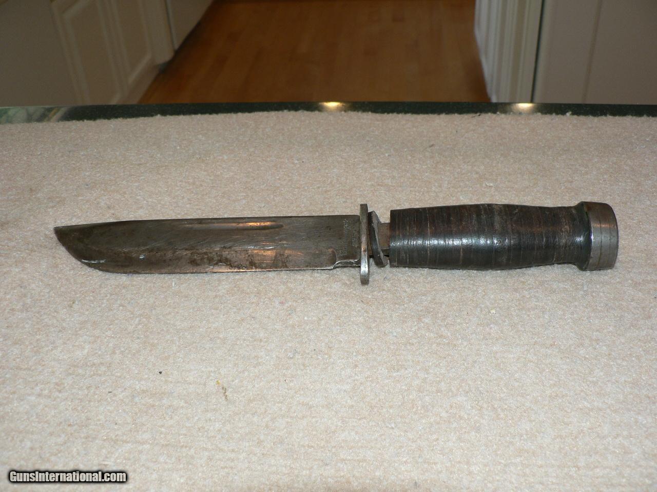 A Pair of K Bar knives