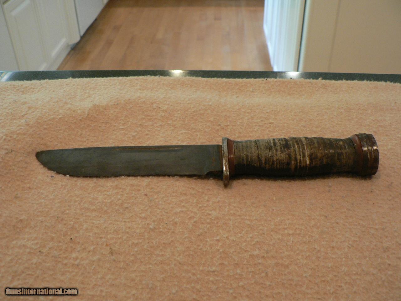 A Pair of K Bar knives