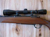 RUGER MODEL 77 "EXTREMELY RARE" FLAT BOLT .284 WIN. CALIBER W/RINGS AND FACTORY OPEN SIGHTS, 3X9 LEUPOLD - 7 of 15
