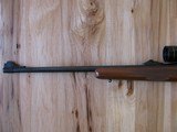 RUGER MODEL 77 "EXTREMELY RARE" FLAT BOLT .284 WIN. CALIBER W/RINGS AND FACTORY OPEN SIGHTS, 3X9 LEUPOLD - 8 of 15