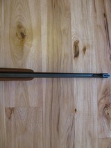 RUGER MODEL 77 "EXTREMELY RARE" FLAT BOLT .284 WIN. CALIBER W/RINGS AND FACTORY OPEN SIGHTS, 3X9 LEUPOLD - 12 of 15