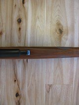 RUGER MODEL 77 "EXTREMELY RARE" FLAT BOLT .284 WIN. CALIBER W/RINGS AND FACTORY OPEN SIGHTS, 3X9 LEUPOLD - 10 of 15