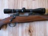 RUGER MODEL 77 "EXTREMELY RARE" FLAT BOLT .284 WIN. CALIBER W/RINGS AND FACTORY OPEN SIGHTS, 3X9 LEUPOLD - 4 of 15
