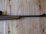 RUGER MODEL 77 "EXTREMELY RARE" FLAT BOLT .284 WIN. CALIBER W/RINGS AND FACTORY OPEN SIGHTS, 3X9 LEUPOLD - 5 of 15