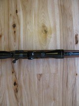 RUGER MODEL 77 "EXTREMELY RARE" FLAT BOLT .284 WIN. CALIBER W/RINGS AND FACTORY OPEN SIGHTS, 3X9 LEUPOLD - 13 of 15