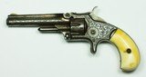EARLY NIMSCHKE ENGRAVED SMITH & WESSON 22 RIMFIRE SINGLE ACTION, 1ST MODEL, 3RD ISSUE, ORIGINAL IVORY GRIPS - 1 of 14