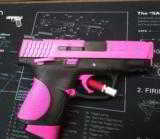 Pink S&W M&PC 40 caliber pistol with thumb safety - 1 of 1
