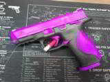 Purple S&W M&P 40 handgun with thumb safety - 1 of 1