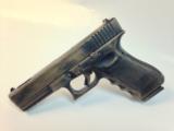 For Sale: Glock 17C 9mm Pistol in Battle Worn Bronze - 1 of 1