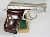 TAURUS PT 22 STAINLESS WITH GOLD ACCENTS. - 2 of 6