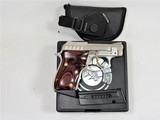 TAURUS PT 22 STAINLESS WITH GOLD ACCENTS. - 1 of 6