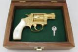 SMITH & WESSON, MODEL 36, "ENGRAVED & GOLD PLATED"
- 21 of 21