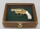SMITH & WESSON, MODEL 36, "ENGRAVED & GOLD PLATED"
- 1 of 21