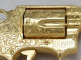SMITH & WESSON, MODEL 36, "ENGRAVED & GOLD PLATED"
- 16 of 21