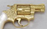 SMITH & WESSON, MODEL 36, "ENGRAVED & GOLD PLATED"
- 5 of 21