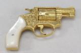 SMITH & WESSON, MODEL 36, "ENGRAVED & GOLD PLATED"
- 3 of 21