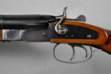 Rossi,
outside hammer,
Coach gun,
20 gauge - 7 of 12