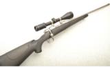 Winchester Model 70 Stainless/Synthetic .338 Winchester with 3.5-10x50 Burris Fullfield II - 1 of 7