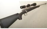Remington Model 700 .300 Remington Ultra Magnum 24" SS Tapered Barrel w/Comp - 1 of 7
